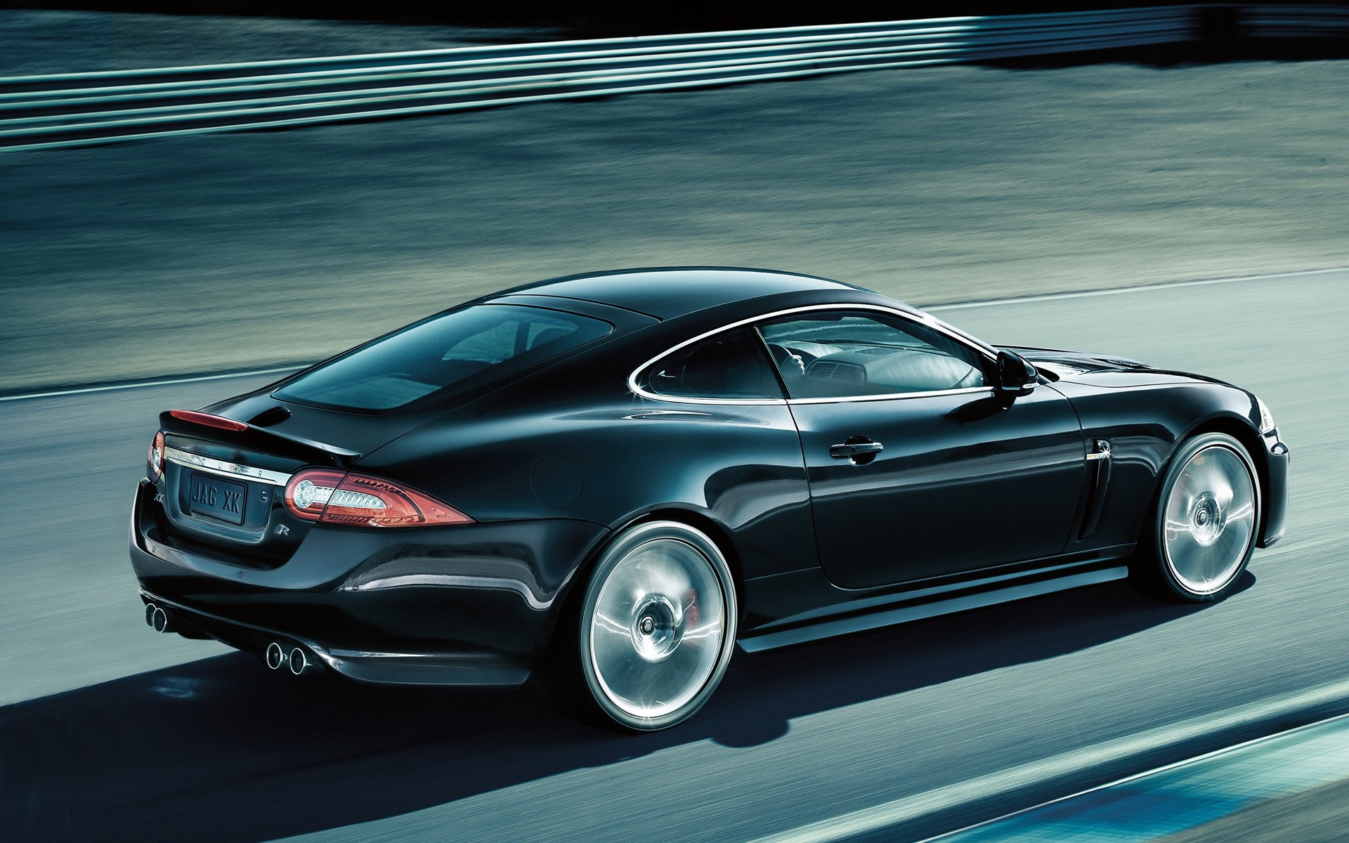 jaguar автомобиль автомобиль автомобильная быстро купе транспортная система асфальт колеса спешите тротуар диск чернушка седан капот показать скорость ягуар и передовыми технологиями
