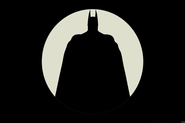 Силуэт Супермена на фоне луны