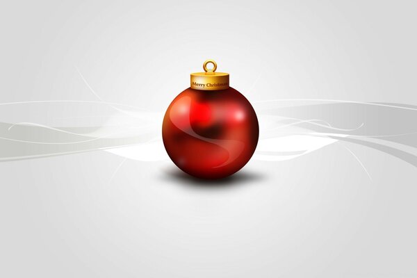 Красный новогодний шарик на сером фоне